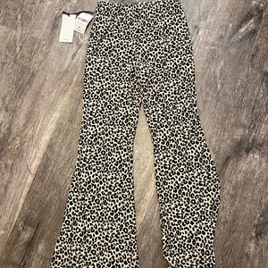 Flare cheetah pants.Never worn, tag still attached